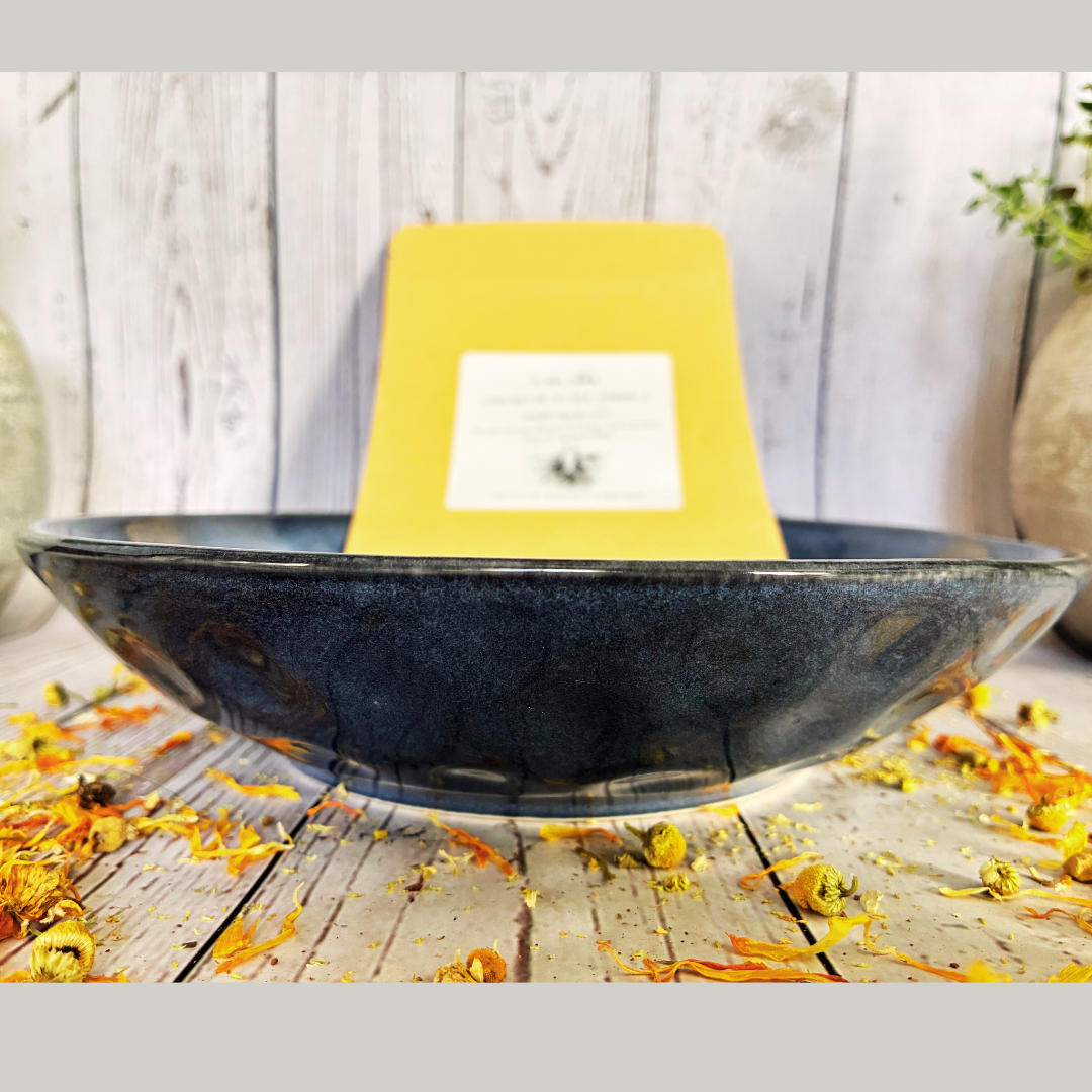 Water basin with river rock + beneficial bug booster to attract frogs and toads for backyard wildlife